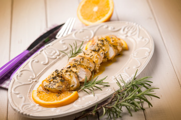 roasted meat with orange sauce, selective focus