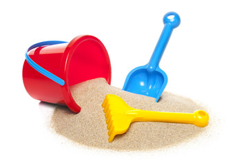 Toy bucket rake and spade isolated on white background © Elena Milevska