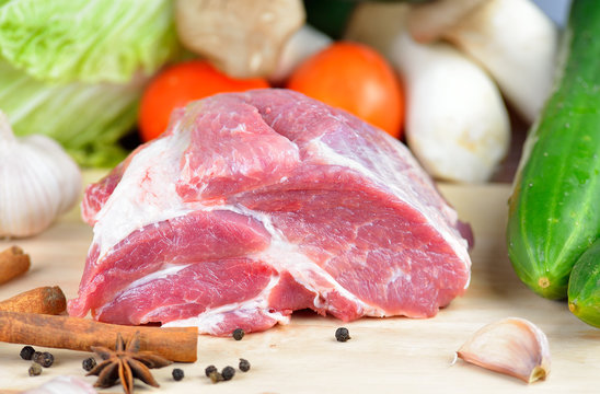 fresh pork meat on a cutting board