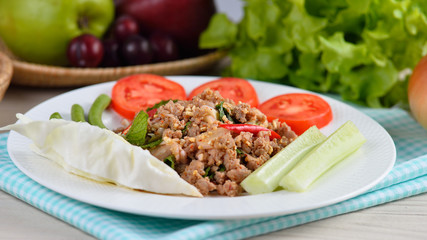 Thai food, spicy pork with chili and mint