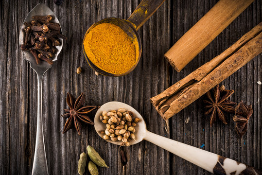 Mixed spices in different spoons