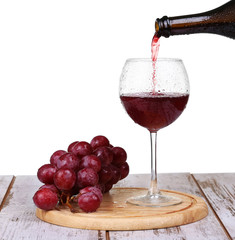 wine glass with red wine, bottle of wine and  isolated 