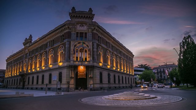 Sunset over Townhall of Legnano in Italy timelapse moving clouds