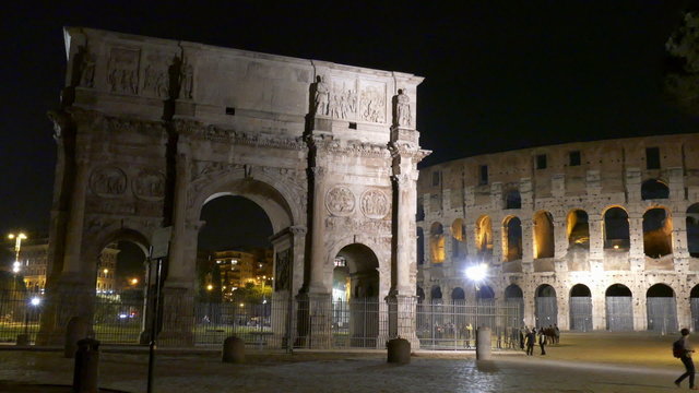 Arch and Colosseum / Triumphal Arch and Colosseum in Rome by night