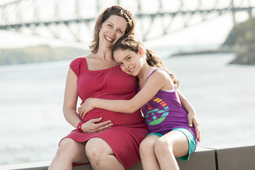 pregnant mother and her daughter