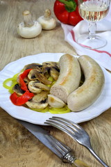 French cuisine: white sausage and a glass of white wine