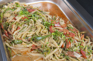 Calamari with vegetables at an oriental restaurant buffet