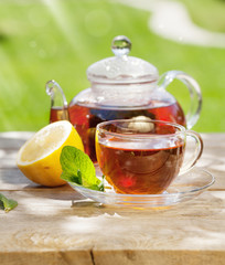 Breakfast tea on table in garden