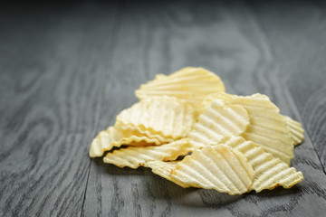 rippled organic chips on wooden table