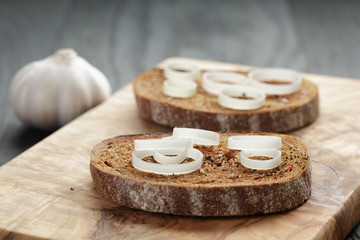 rye bread grated with garlic with leek, crostini