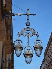 Fototapeta na wymiar Barcelona public light lamp in a blue sky day 