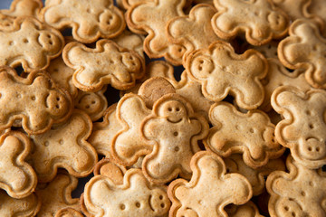 Lots of man and christmas tree shaped cookies, ginger bread 