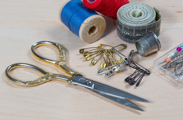 scissors, thread, pins.