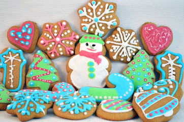 Fototapeta na wymiar Christmas Homemade Gingerbread Cookies in Different Shapes 