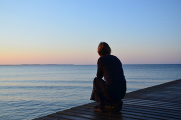 Woman on brew in Sunrise