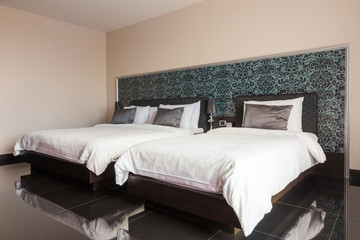 Fototapeta na wymiar Bright bedroom with marble floor