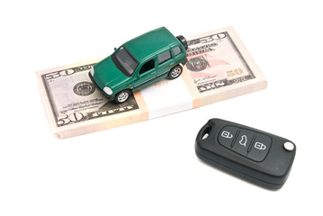 car keys, green car and money