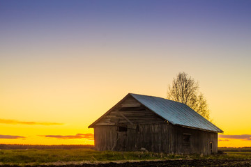 Barn House Against The Spring Sunset