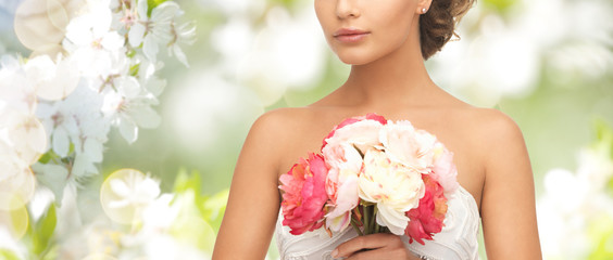 bride or woman with bouquet of flowers