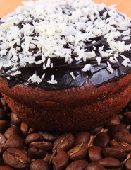 Chocolate muffins with desiccated coconut and coffee grains