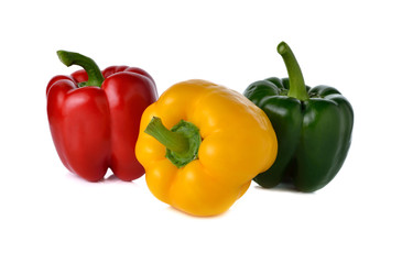 red yellow green bell pepper on white background