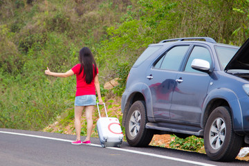 Woman stopping car