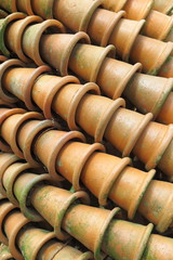 Stacks of old clay flowerpots