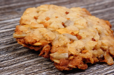 Oatmeal cookies on wooden background