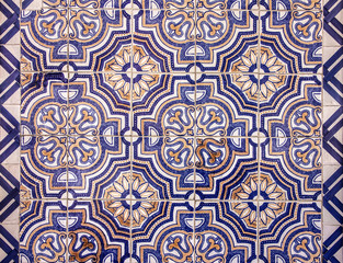 Ancient ceramic tile in Lisbon street, Portugal.