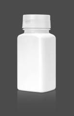 blank white supplement packaging bottle isolated on gray backgro