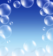 Transparent soap bubbles like frame on blue background