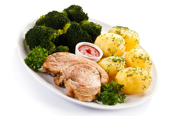 Steak, boiled potatoes and vegetables 