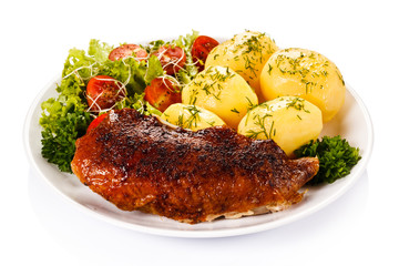 Roast duck fillet and vegetables 