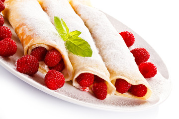 Crepes with raspberries and cream 