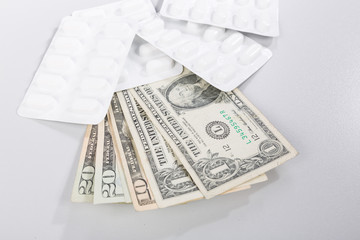 Tabletten und Geld