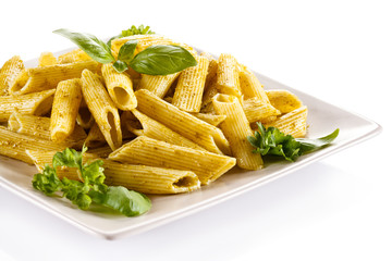 Pasta with pesto sauce, parmesan and vegetables 