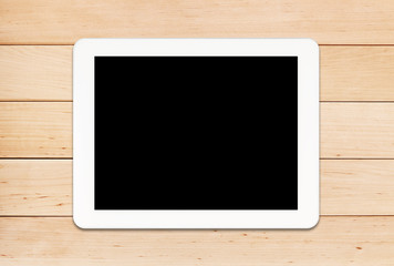 Tablet PC on a wooden table