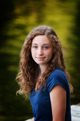 Naklejka premium closeup of a beautiful blue eyed teen girl
