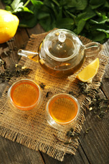 Green tea in cup and teapot 