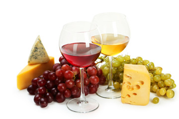 Glass of red and white wine, cheeses and grapes 