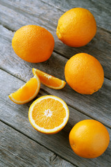 Orange juice in bottle and orange in basket 