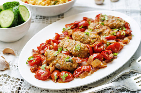 meat sausages with tomatoes