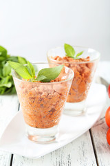 Glass with granita from fresh tomatoes 