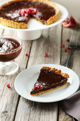 Homemade chocolate tart with pomegranate 