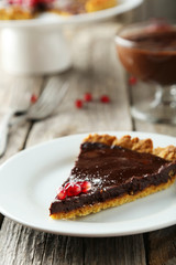 Homemade chocolate tart with pomegranate 