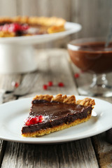 Homemade chocolate tart with pomegranate 