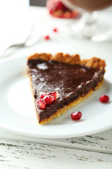 Homemade chocolate tart with pomegranate 