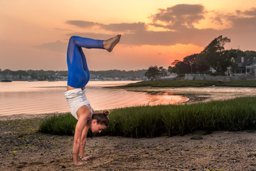 Yoga Handstand On Beach at Sunset