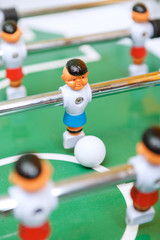 Fototapeta premium Happy friends playing table hockey