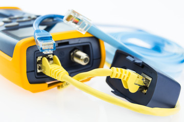 network RJ45 cable tester and a few various cables